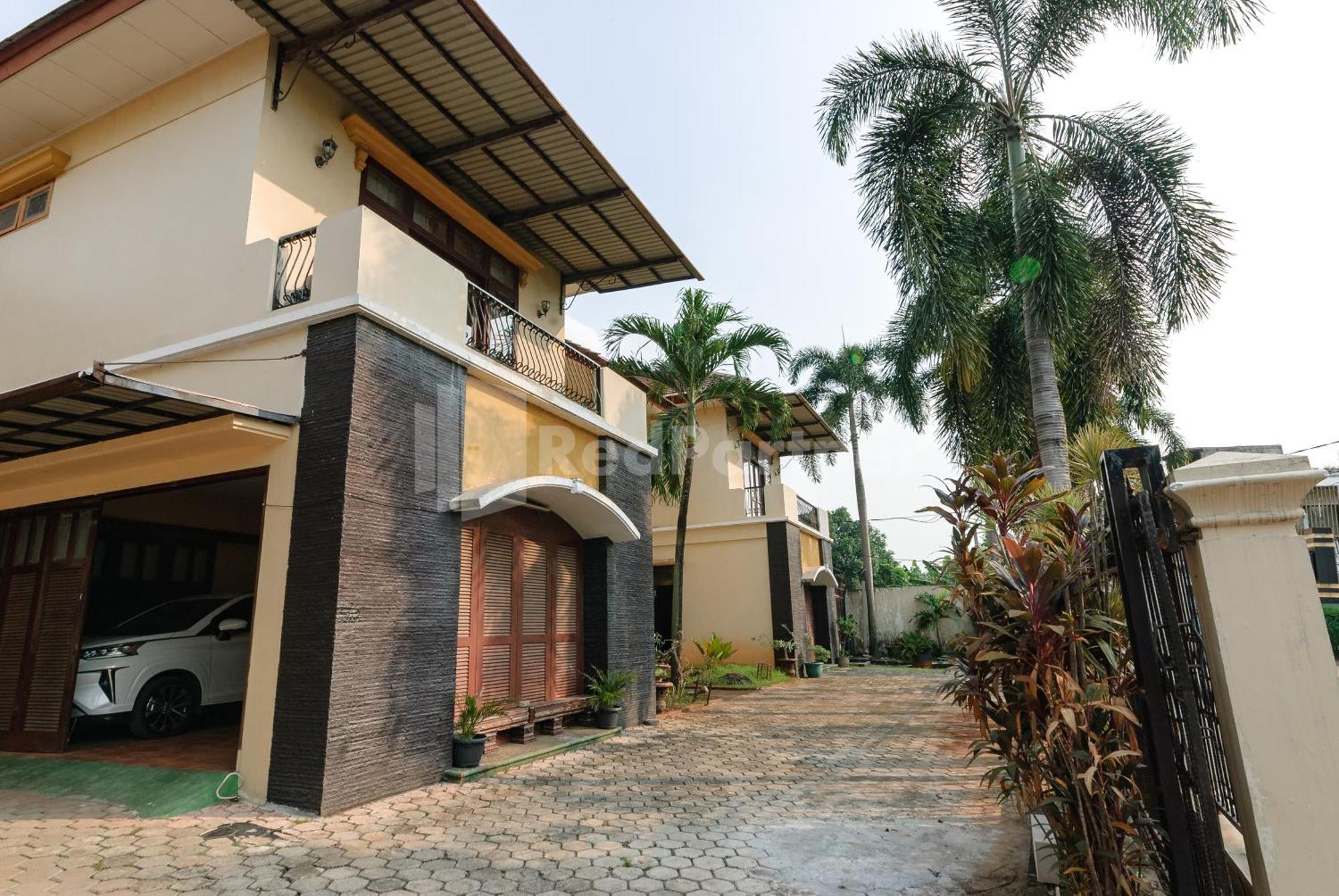 Sr Residence Near Mall Ciputra Cibubur Mitra Reddoorz Bekasi Buitenkant foto